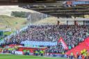 The banner held aloft by Celtic fans