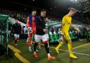 Rangers and Celtic come out of the tunnel at Parkhead