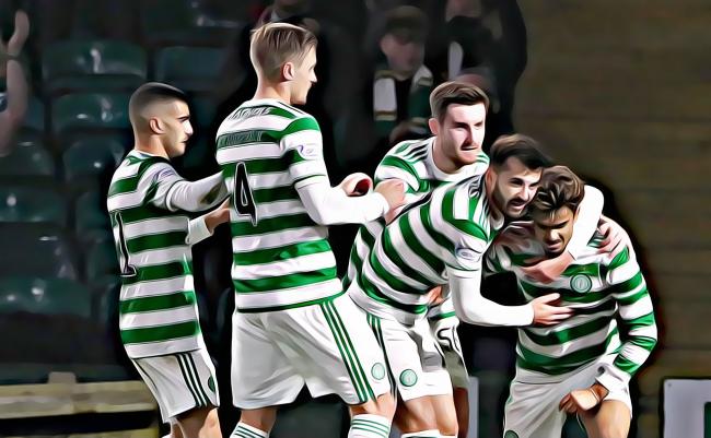 The Celtic players mob Jota, right, after his opening goal against Raith