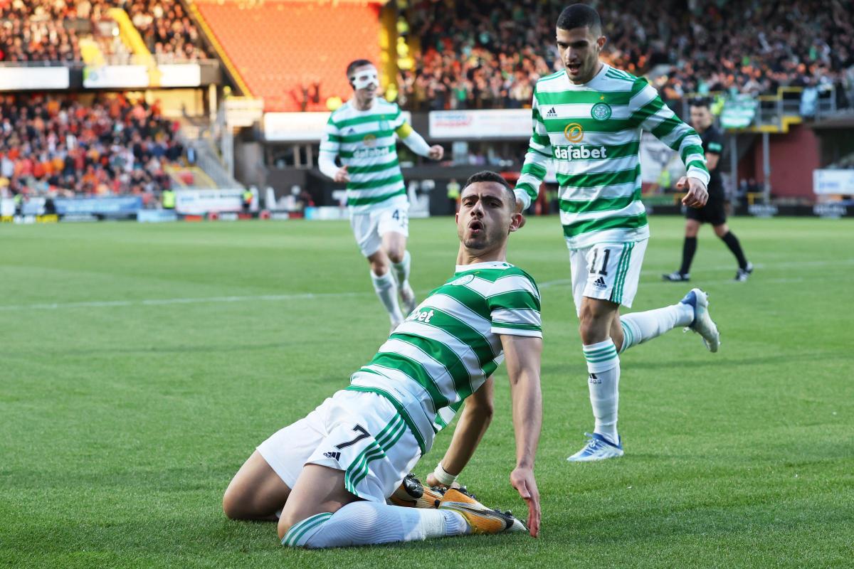 Giorgos Giakoumakis celebrates after scoring the goal that ultimately sealed the Premiership title for Celtic.