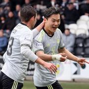 Oh Hyeon-gyu celebrates making it 5-1 for Celtic against St Mirren