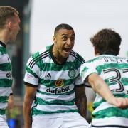 Celtic striker Adam Idah, centre, celebrates scoring the opening goal against Kilmarnock in the cinch Premiership game at Rugby Park this evening