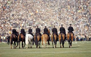 Mounted police on the pitch after the 1980 Scottish Cup final at Hampden